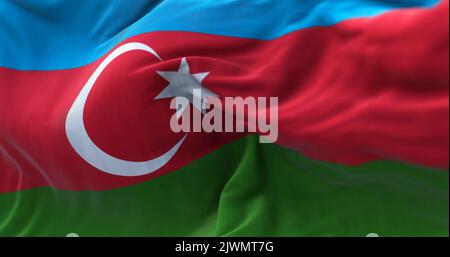 Close-up view of the azerbaijani national flag waving in the wind. Azerbaijan is a transcontinental country located at the boundary of Europe and Asia Stock Photo