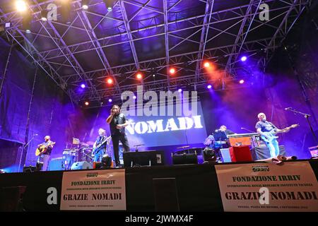 Vicenza, VI, Italy - September 4, 2022: Concert of Italian band NOMADI and banner of FONDAZIONE IRRIV Stock Photo