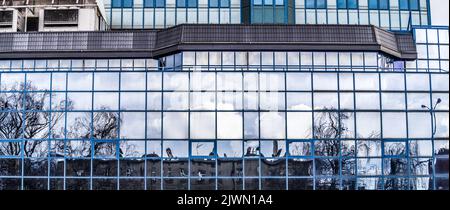 Reflective glass on modern building Stock Photo