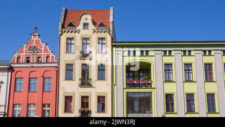 Colorful facades of historic houses in Torun, Poland Stock Photo