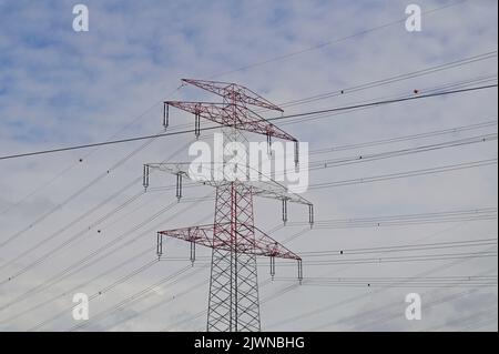 Steel lattice mast for the suspension of an overhead electrical line Stock Photo