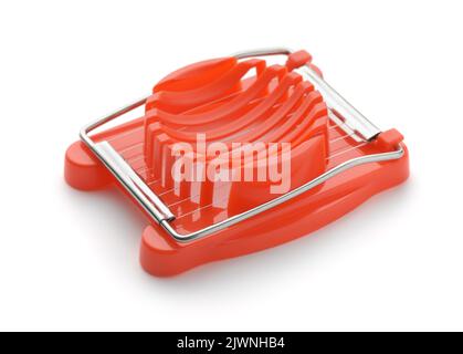 Red plastic wire egg slicer isolated on white Stock Photo