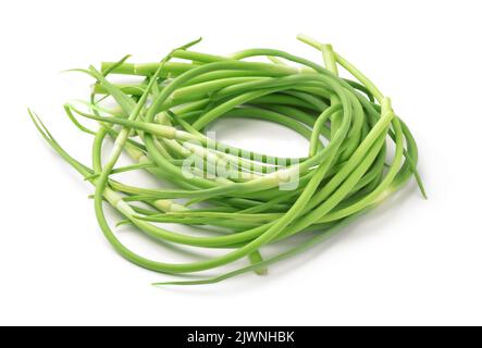 Fresh young garlic scapes isolated on white Stock Photo