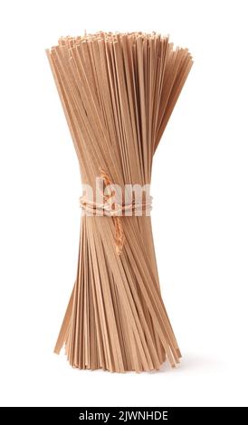 Bunch of uncooked buckwheat soba noodles isolated on white Stock Photo