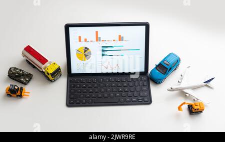 different types of toy transport and a tablet Stock Photo
