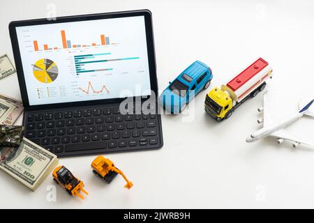 different types of toy transport and a tablet Stock Photo