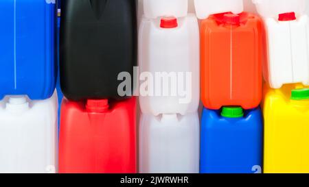 Multicolored plastic jerry can containers Stock Photo
