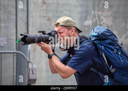 Male photographer at work Stock Photo