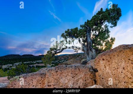 Tsankawi Section of Bandelier National Monument at Sunset. Smoke from Forest Fire in the Sky. New Mexico, USA Stock Photo