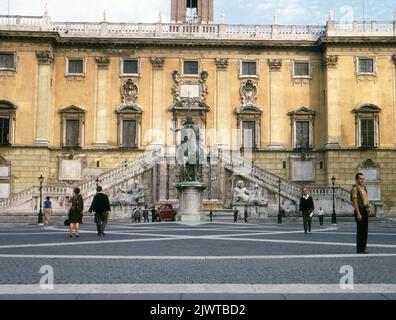 Rome, Italy, 1963. A view of the Palazzo Senatorio, the town hall of the city of Rome since 1144, making it the oldest town hall in the world. It is situated in the Piazza del Campidoglio, a monumental square which is located on the top of the Campidoglio hill. In front of the Palazzo is a statue of Marcus Aurelius on horseback. Stock Photo