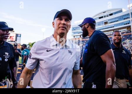 Winston-Salem, NC, USA. 1st Sep, 2022. Wake Forest Demon Deacons head coach Dave Clawson walks off after warm ups before the NCAA football match up at Truist Field in Winston-Salem, NC. (Scott Kinser/CSM). Credit: csm/Alamy Live News Stock Photo