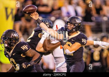 Winston-Salem, NC, USA. 1st Sep, 2022. Wake Forest Demon Deacons quarterback Mitch Griffis (12) throws on third down during the second quarter of the NCAA football match up at Truist Field in Winston-Salem, NC. (Scott Kinser/CSM). Credit: csm/Alamy Live News Stock Photo