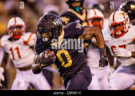 Winston-Salem, NC, USA. 1st Sep, 2022. Wake Forest Demon Deacons running back Christian Turner (0) runs for a touchdown during the second quarter of the NCAA football match up at Truist Field in Winston-Salem, NC. (Scott Kinser/CSM). Credit: csm/Alamy Live News Stock Photo