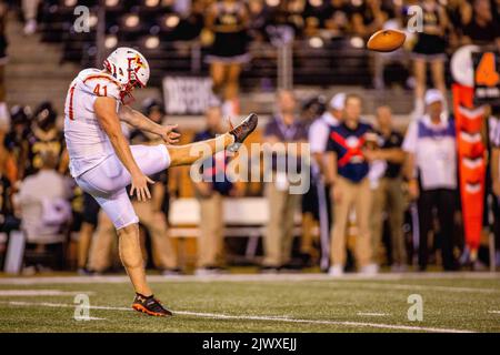 Winston-Salem, NC, USA. 1st Sep, 2022. Virginia Military Institute Keydets place kicker Jack Culbreath (41) punts the ball during the second quarter of the NCAA football match up at Truist Field in Winston-Salem, NC. (Scott Kinser/CSM). Credit: csm/Alamy Live News Stock Photo