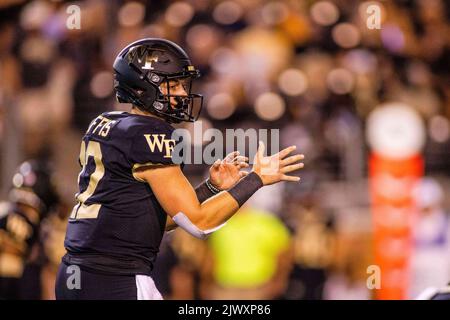 Winston-Salem, NC, USA. 1st Sep, 2022. Wake Forest Demon Deacons quarterback Mitch Griffis (12) checks the defense during the third quarter of the NCAA football match up at Truist Field in Winston-Salem, NC. (Scott Kinser/CSM). Credit: csm/Alamy Live News Stock Photo