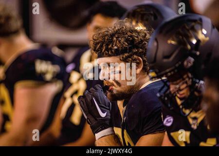 Winston-Salem, NC, USA. 1st Sep, 2022. Wake Forest Demon Deacons defensive lineman Tyler Williams (72) rests on the bench during the fourth quarter of the NCAA football match up at Truist Field in Winston-Salem, NC. (Scott Kinser/CSM). Credit: csm/Alamy Live News Stock Photo