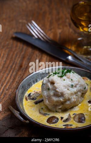 bread dumpling in mushroom sauce Stock Photo