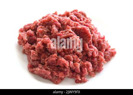 Raw minced beef or ground beef on white background. Stock Photo