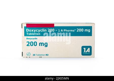 WETZLAR, GERMANY 2022-07-25: Doxycycline antibiotics pills in a cardbox over white background Stock Photo