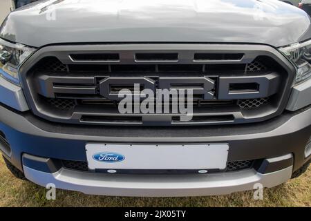 GERMANY - WETZLAR JULY 08: FORD LETTERS in front of a FORD TRUCK Raptor SVT pick-up truck. Stock Photo
