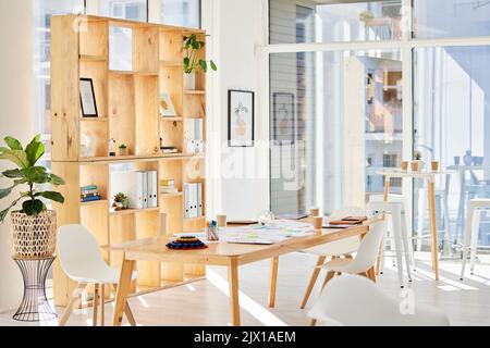 Empty interior office with light, wood furniture and workplace space for business and work. Modern and minimalist design decoration of a corporate or Stock Photo