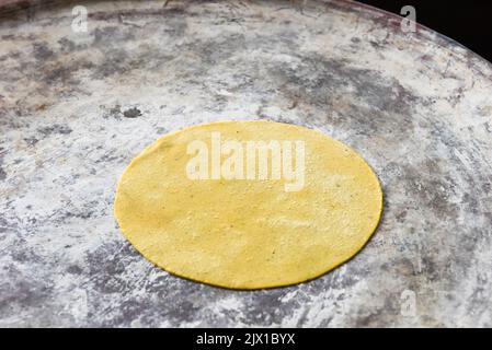 Tortillas cooking on an outdoor oven, Oaxaca Mexico Stock Photo