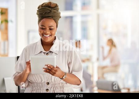 Business woman, tablet and typing report in the office about positive employee review feedback. Corporate lady feeling hope, motivation and happy with Stock Photo