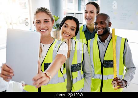 Happy, architects and team selfie with tablet at the office in collaboration and teamwork success. Group of diverse professional people smile in Stock Photo