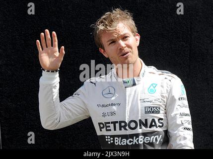 **FILE** A Thursday, March 12, 2015 image reissued Saturday, Dec. 3, 2016 of German Mercedes Formula One driver Nico Rosberg posing for the official driver's photo on day 1 of the F1 Australian Grand Prix, at Albert Park race track in Melbourne. Formula One world champion Nico Rosberg has shocked the sporting world by announcing his retirement just five days after he claimed his maiden Drivers' Championship in Abu Dhabi. (AAP Image/Joe Castro)