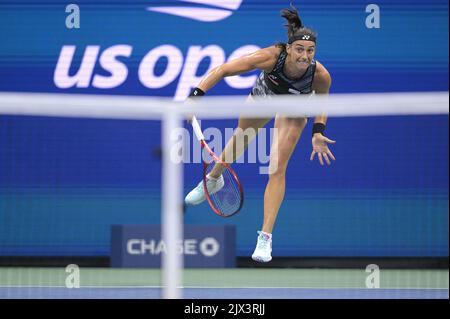 New York, USA. 06th Sep, 2022. Caroline Garcia, of France, serves to Coco Gauff, of the United States, during the women's quarter-final rounds of the U.S. Open tennis championships at the USTA Billie Jean King National Tennis Center in Flushing Meadows Corona Park New York, September 6, 2022. (Photo by Anthony Behar/Sipa USA) Credit: Sipa USA/Alamy Live News Stock Photo