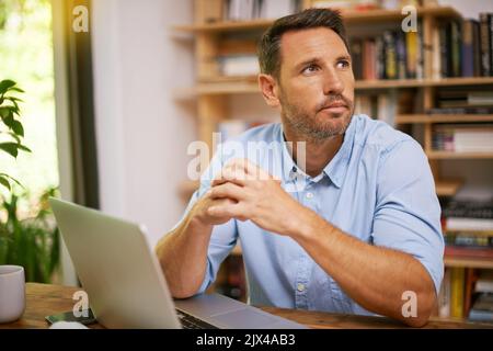 Hes always thinking of ways to achieve success. a young man working from home. Stock Photo