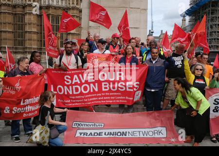 London, UK. 6th September, 2022. Members of the Unite Union stand with banners at an organised rally, after proposed plans by Transport for London (TfL) to axe 16 bus services and make changes to 78 routes, in an bid to save money following a drastic reduction in income during the pandemic, with the organisation's finances facing a black hole with a £1.9bn funding gap. London is the only capital city in Europe to not have government subsidised transport. Credit: Eleventh Hour Photography/Alamy Live News