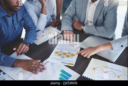 Hands teamwork, planning and paperwork, documents or charts doing research, data and budget report. Corporate people discussing graphs, financial Stock Photo