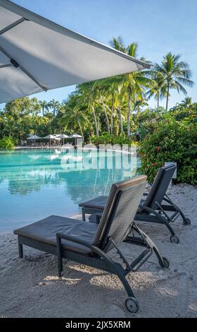 A view along one of the many pool areas available at this 5 Star luxury resort at the Sheraton Mirage Port Douglas in Far North Queensland, Australia. Stock Photo