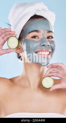 Skincare woman, facial mask and cucumber beauty cosmetics after fresh shower, bathroom grooming routine and cool bodycare. Portrait feminine face Stock Photo