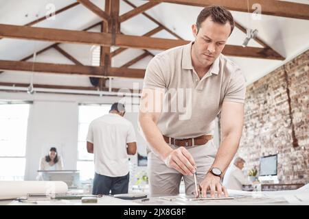 Architect man, engineer or blueprint writing designer planning building architecture on paper. Property construction worker, creative employee or Stock Photo
