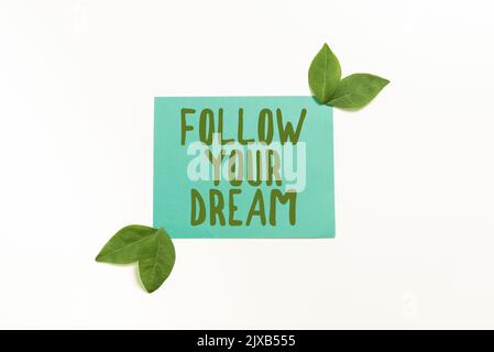 Hand writing sign Follow Your DreamKeep track on your goals Live the life you want to be. Conceptual photo Keep track on your goals Live the life you Stock Photo