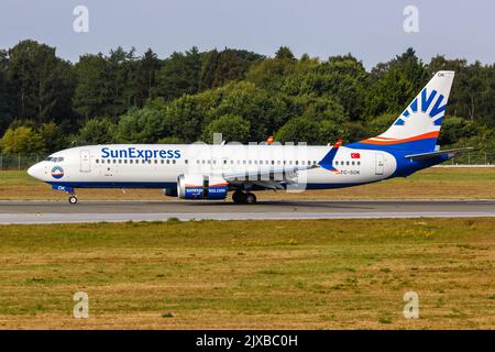 Hamburg, Germany - August 14, 2022: SunExpress Boeing 737 MAX 8 airplane at Hamburg airport (HAM) in Germany. Stock Photo