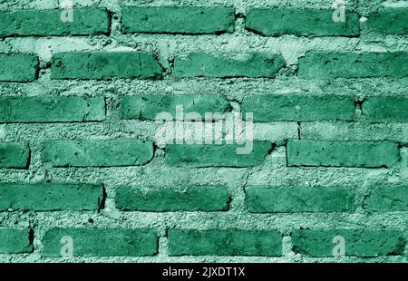 Front View of Jungle Green Colored Grunge Brick Wall for Abstract Backdrop Stock Photo