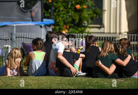 People Are Seen Leaving Tributes To 8-year-old Brodie At The House In ...