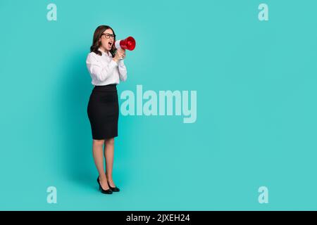 Full size photo of outraged lady executive shout loud speaker isolated on cyan color background Stock Photo