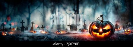 Halloween - Pumpkins In Spooky Forest With Tombs At Night - Abstract Defocused Background Stock Photo
