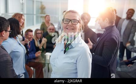 Mature female businesswoman on the meeting in the office Stock Photo