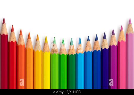 Color pencils concave curve isolated on background. Close up. Stock Photo