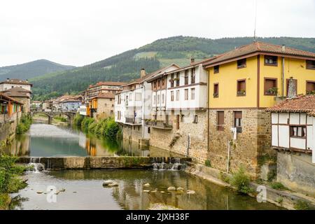 Set of typical Basque houses next to the river in Orozko Stock Photo