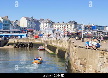 Bridlington Speed Boat Rides Bridlington marina and Bridlington Harbour Harbour wall Bridlington East Riding of Yorkshire England UK Europe Stock Photo