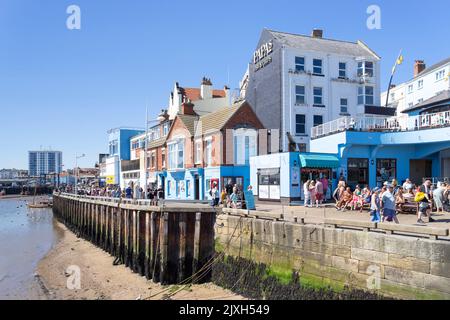 Bridlington old town marina and Bridlington Harbour at low tide showing the harbour wall and jetty East Riding of Yorkshire England UK GB Europe Stock Photo