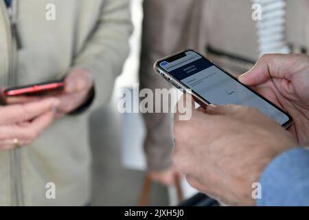 Identifying the reservation, making the payment, with the qr-code on the smartphone Stock Photo
