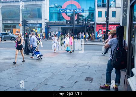 London- August 2022: : Brixton street scene outside the London underground station. A vibrant area of south west London Stock Photo