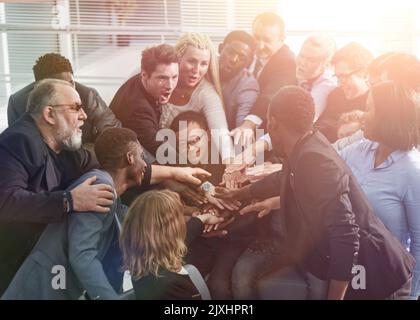 Multiracial friends having fun and laughing, different young peo Stock Photo
